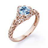 Modern Art Deco 1.10 Carat Round Cut Aquamarine And Diamond Cushion Framed Halo Engagement Ring In Rose Gold