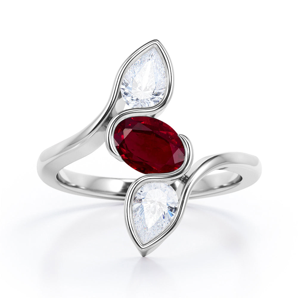 Distorted Line Three Stone 1 carat Oval and Pear Lab Ruby and moissanite Ring in Rose Gold