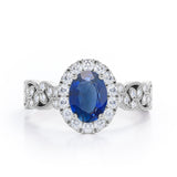 Milgrain Leaf 0.9 carat Oval Blue Sapphire and Diamonds Nature-Inspired Engagement Ring in White Gold