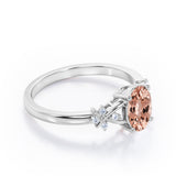 Luxurious Clover Lucky Leaf 0.5 carat Oval Morganite and Diamond Engagement Ring in Rose Gold