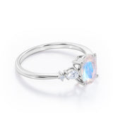 Classic Five Stone 0.6 carat Oval Moonstone and Diamond Engagement Ring in Rose Gold