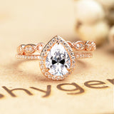 1.75 Carat pear cut Moissanite and Diamond Wedding Ring Set in 10k Rose Gold