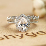 1.50 Carat pear cut Moissanite Wedding Ring Set in 18k White Gold Over Silver
