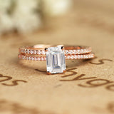 1.50 Carat emerald cut Moissanite and Diamond Halo Bridal Set in 10k Rose Gold