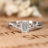 1.25 Carat emerald cut Moissanite and Diamond Solitaire Infinity Engagement Ring in 10k White Gold