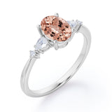 Classic Five Stone 0.6 carat Oval Morganite and Diamond Engagement Ring in Rose Gold