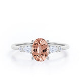 Classic Five Stone 0.6 carat Oval Morganite and Diamond Engagement Ring in Rose Gold