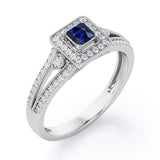 Split-Shanked Pave 1.55 Carat Princess Cut Blue Sapphire and diamond Milgrain-Bordered Halo Engagement Ring in White Gold