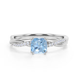 Twisted 1.25 Carat Cushion Cut Aquamarine and Moissanite Engagement Ring in 18k White Gold over Silver