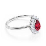 Floral Inspired 1.25 Carat Oval Cut Lab Ruby and Diamond Engagement Ring in White Gold