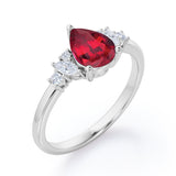 Fashionable 7 Stones 0.6 carat Pear Lab-Created Ruby and Diamond Engagement Ring in White Gold