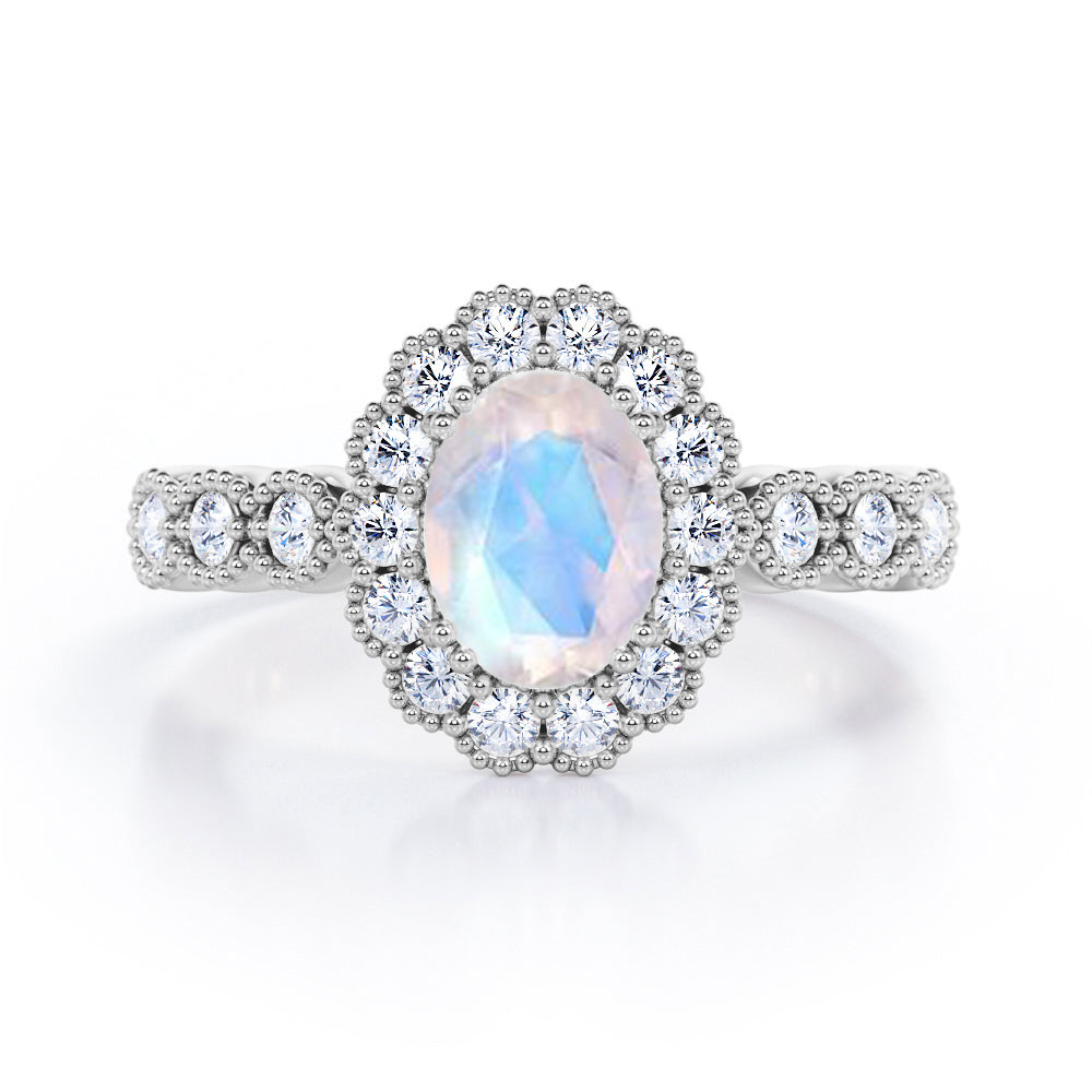 Vintage Floral Halo 0.7 carat Oval and Round Moonstone and diamond Engagement Ring in Rose Gold