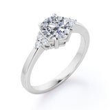 Tapered Classic 0.55 carat Round Moissanite and Diamond Engagement Ring in White Gold