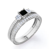 1.25 carat princess cut Black Diamond three stone filigree wedding ring set in white gold
