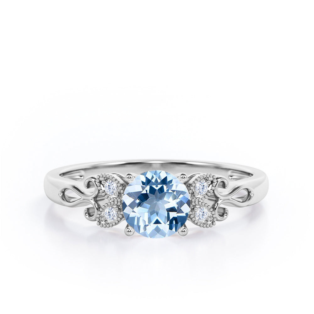 Tiny Butterfly 0.5 carat Round Aquamarine and Diamond Vintage Engagement Ring in Rose Gold