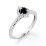 1 carat round cut Black Diamond halo engagement ring in white gold