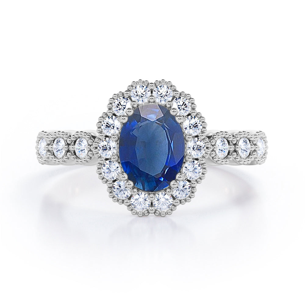 Vintage Floral Halo 0.7 carat Oval and Round Blue Sapphire and diamond Engagement Ring in Rose Gold