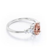 Classic Five Stone 0.6 carat Oval Morganite and Diamond Engagement Ring in Rose Gold