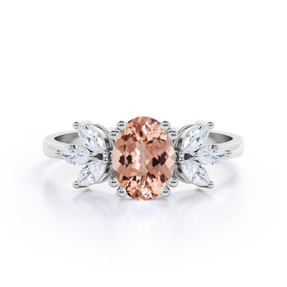 Seven Stones 0.55 carat Oval Morganite and Moissanite Leafy Engagement Ring in Rose Gold