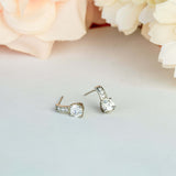 Charming 1 Carat Round Moissanite Earrings in 18K White Gold Plating over Silver
