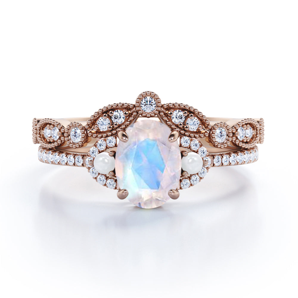 Antique 0.9 carat Oval Moonstone and Moissanite Wedding Ring Set in Black Gold