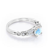 Split Shank 0.6 carat Round Moonstone and Diamond Engagement Ring in Rose Gold