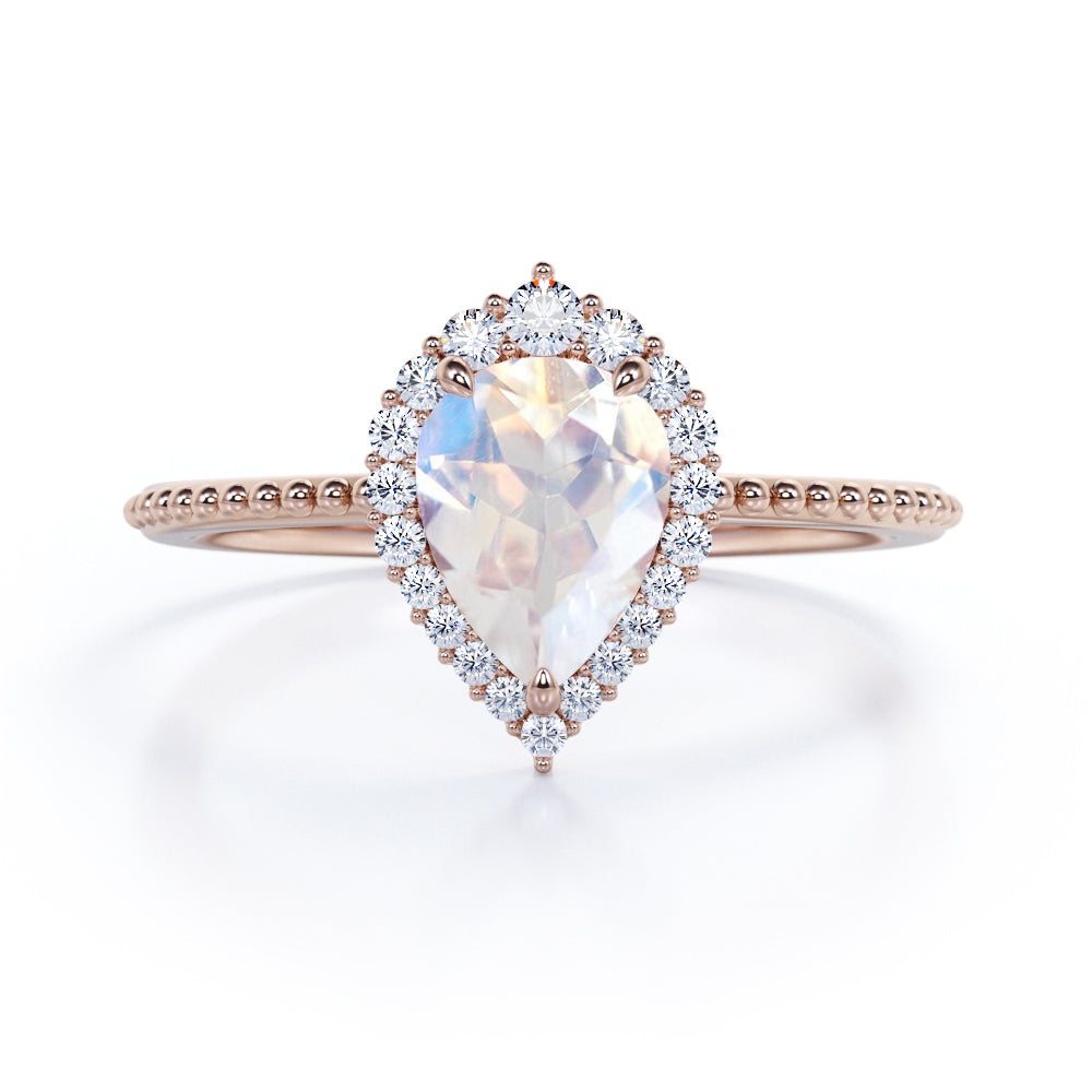 Beaded Band 0.7 carat Pear Moonstone and Moissanite Halo Anniversary Ring in Black gold