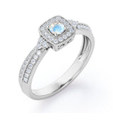 Double Pave Channel 1.5 Carat Round-Shaped Moonstone and diamond Halo Cluster Engagement Ring in Rose Gold