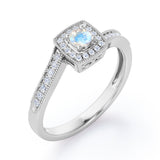 Flush-Prong Halo 1.25 Carat Round Cut Moonstone and diamond Milgrain-Edged Pave Channel Engagement Ring in White Gold