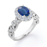 Milgrain Leaf 0.9 carat Oval Blue Sapphire and Diamonds Nature-Inspired Engagement Ring in White Gold