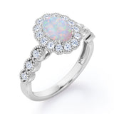 Vintage Floral Halo 0.7 carat Oval and Round Opal and diamond Engagement Ring in Rose Gold