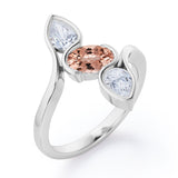 Distorted Line Three Stone 1 carat Oval and Pear Morganite and moissanite Ring in Rose Gold