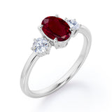 Trio 0.80 ct Oval Lab-Created Ruby Engagement Ring