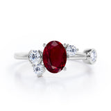 Unique 1 carat Oval Five Stone Ring With Petite Ruby and Diamond in White Gold