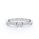 Bowtie 0.7 carat Round Moissanite and Diamond Pinched Shank Anniversary Ring in White Gold