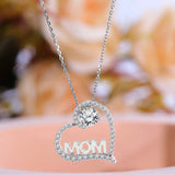 Heart Shaped Moissanite Pendant Necklace in 18K White Gold over Silver