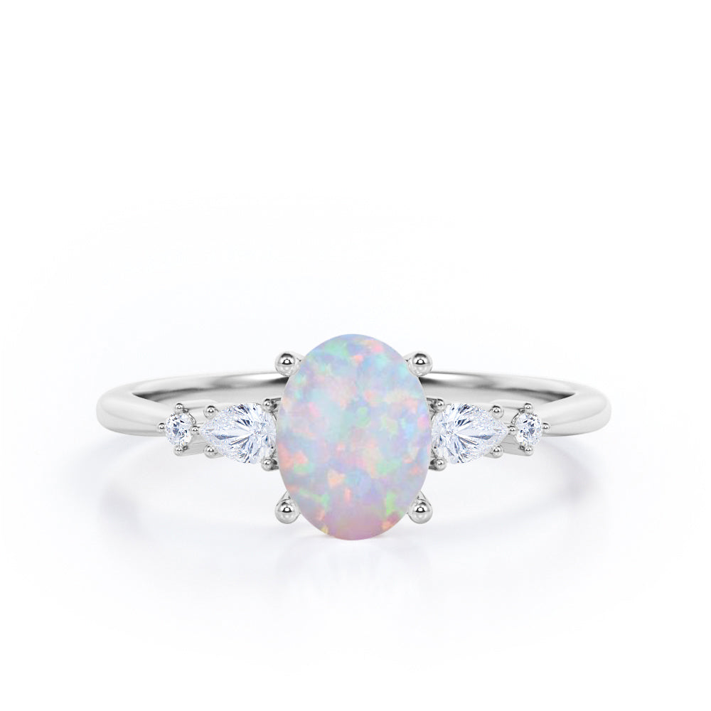 1.1 Ct Oval Cut Lab Created Opal Five Stone Engagement Ring