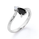 1 carat tear drop cut Black Diamond V shaped style engagement ring in white gold