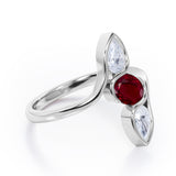 Distorted Line Three Stone 1 carat Oval and Pear Lab Ruby and moissanite Ring in Rose Gold