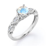 Decorative Basket Prong 0.5 carat Round Moonstone and Diamond Nature-Inspired Ring in Rose Gold