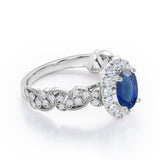 Milgrain Leaf 0.9 carat Oval Blue Sapphire and Diamonds Nature-Inspired Engagement Ring in White Gold