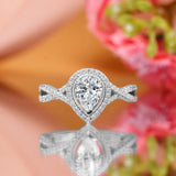 Infinity Style 1.50 Carat Teardrop Shape Moissanite and Diamond Halo Engagement Ring in White Gold