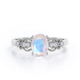 Swirly 0.5 carat Oval Moonstone and Diamonds Antique Engagement Ring in Rose Gold
