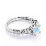 Decorative Basket Prong 0.5 carat Round Moonstone and Diamond Nature-Inspired Ring in Rose Gold