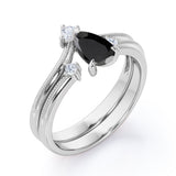 1 carat tear drop cut Black Diamond V shaped wedding ring set in white gold