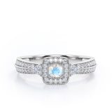 Double Pave Channel 1.5 Carat Round-Shaped Moonstone and diamond Halo Cluster Engagement Ring in Rose Gold