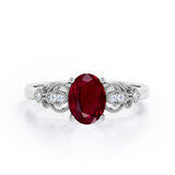 Swirly 0.5 carat Oval Lab Ruby and Diamonds Antique Engagement Ring in Rose Gold
