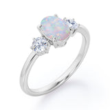 Three Stone 1.1 Ct Oval Cut Lab Created Opal Engagement Ring
