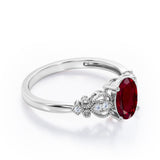 Swirly 0.5 carat Oval Lab Ruby and Diamonds Antique Engagement Ring in Rose Gold
