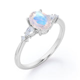 Classic Five Stone 0.6 carat Oval Moonstone and Diamond Engagement Ring in Rose Gold